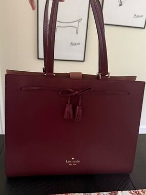 kate spade burgundy leather tote with tassels